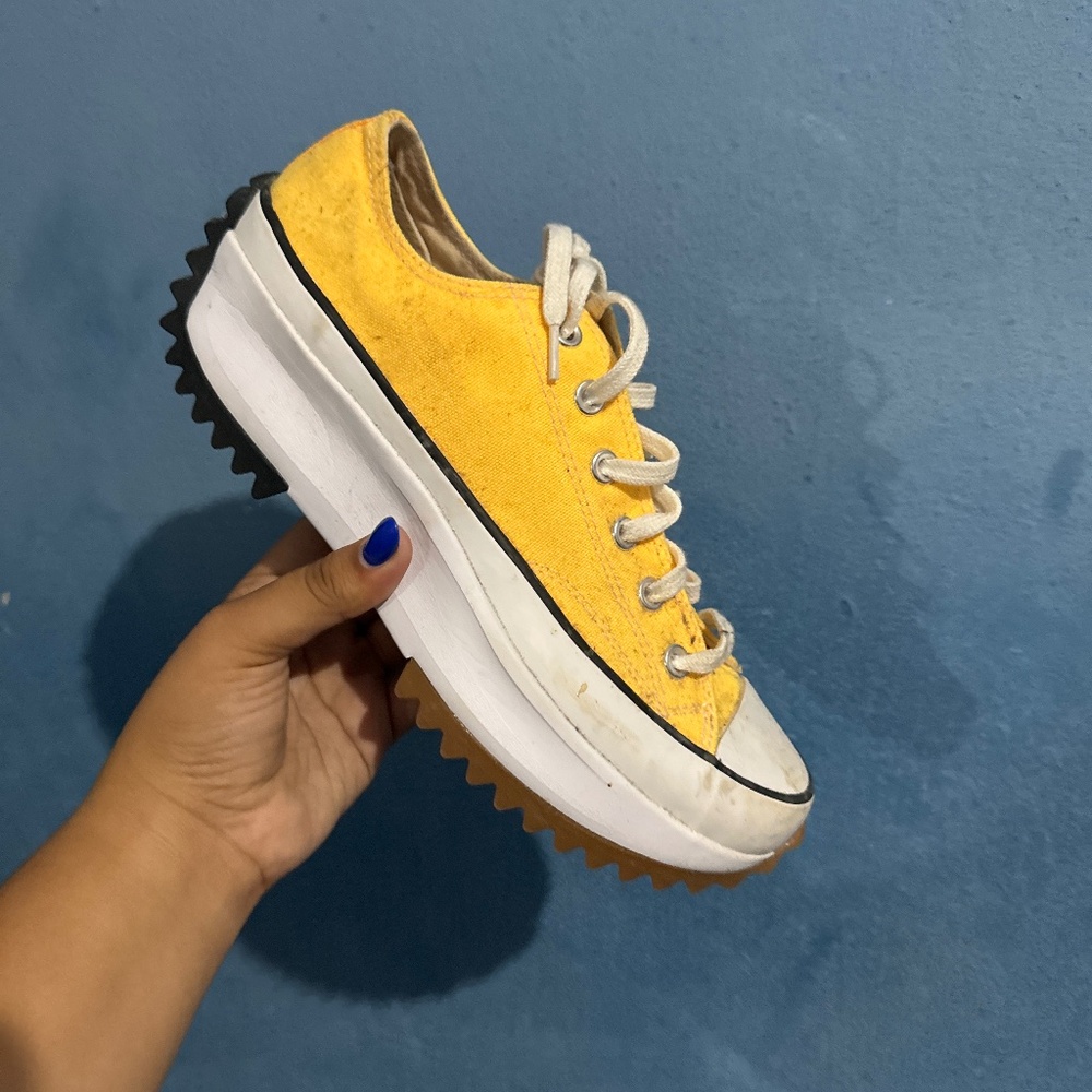 Yellow Converse sneakers